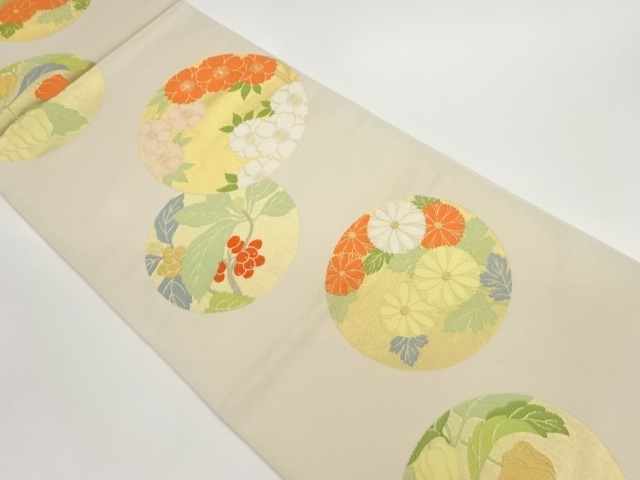 丸文に草花模様織出し全通袋帯